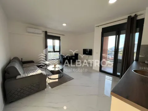 Living room with a sofa and access to the terrace. - image 2