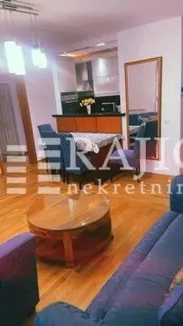 Living room with dining area and view of the kitchen. - image 4