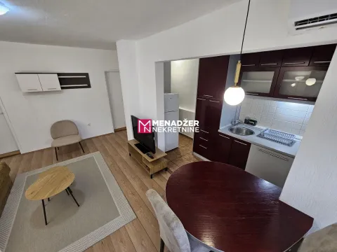 Living room with dining area and kitchen. - image 3