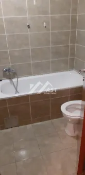 Bathroom equipped with a bathtub and sanitary ware with ceramic tiles. - image 7