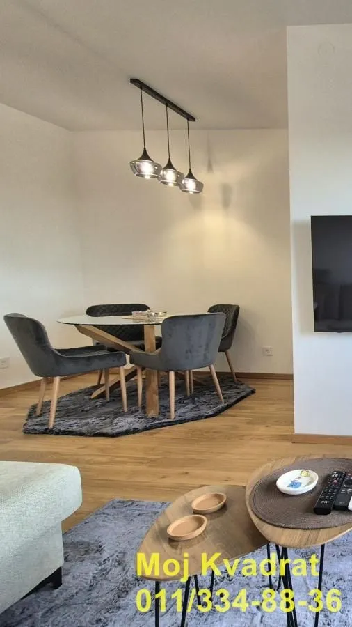 Living room with a dining area and seating furniture.