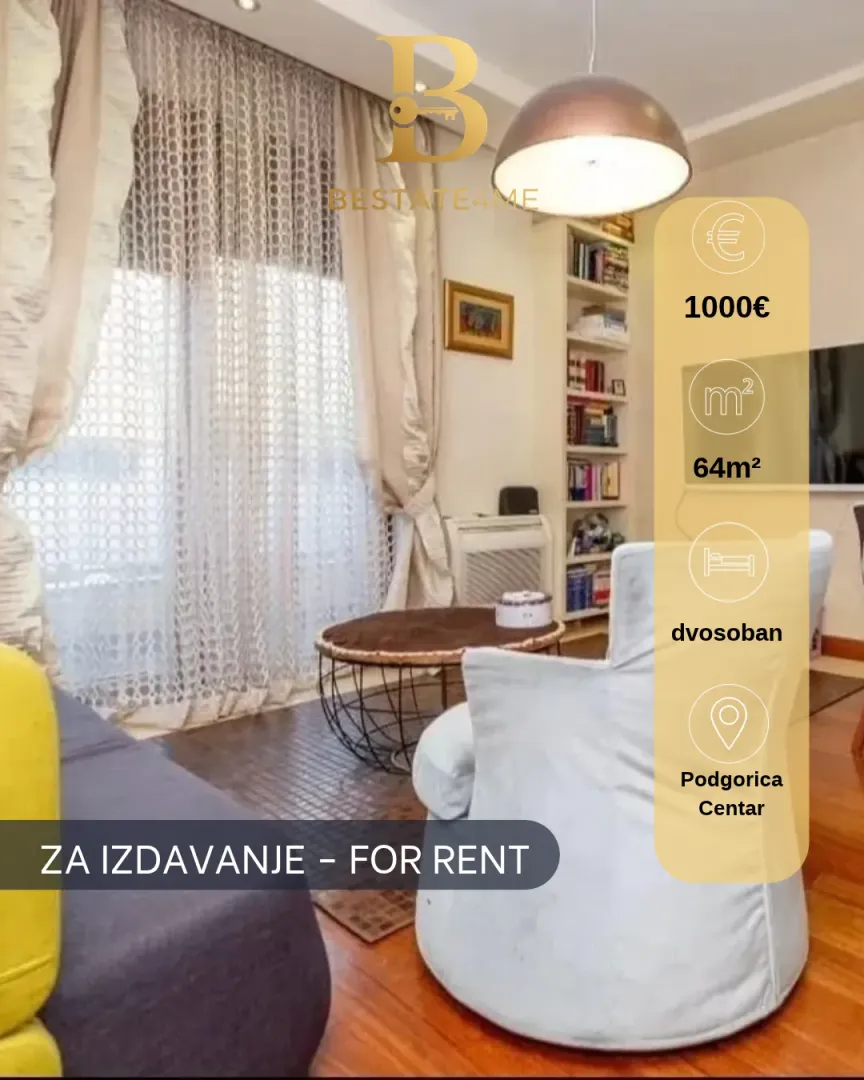 Living room with a sofa and a bookshelf.
