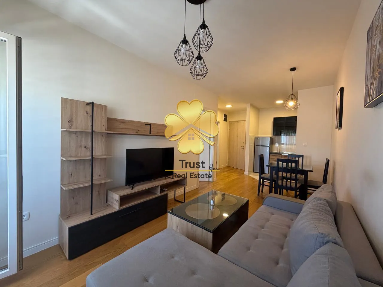 Living room connected to the dining area and kitchen.