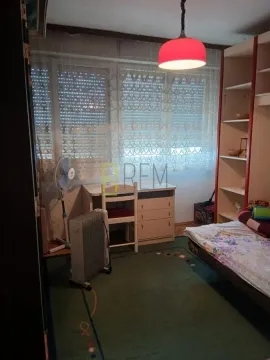 Children's bedroom with a bed, desk, and wardrobe. - image 10