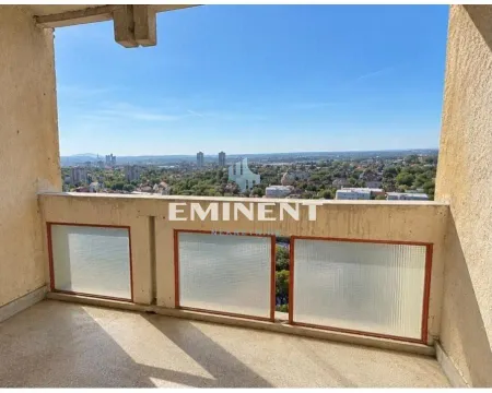 Unfurnished balcony with a city view. - image 8