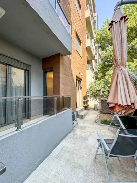 Terrace with paved flooring and patio furniture. - image 6