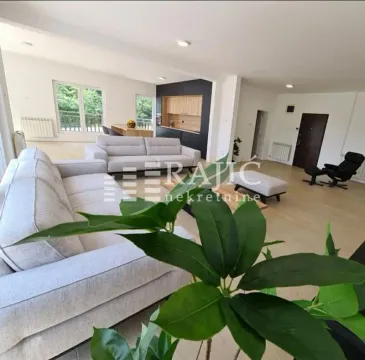 Spacious bright living room connected to the dining area and kitchen. - image 9