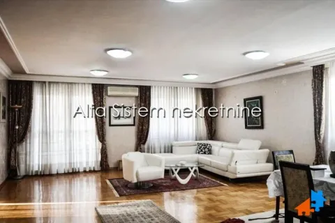 Spacious living room with a seating set and dining table. - image 2