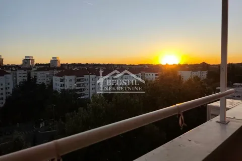View of the city from the terrace during sunset. - image 10