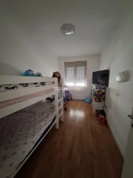 Children's bedroom with a bunk bed and wooden flooring. - image 5
