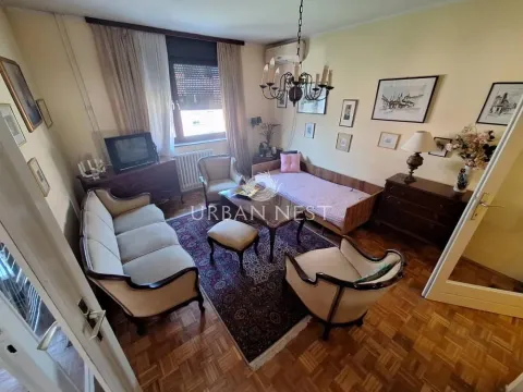 Furnished living room with seating set and parquet flooring. - image 2