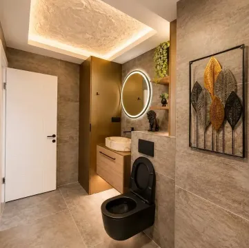Modern bathroom with black sanitary ware and decorative elements. - image 5
