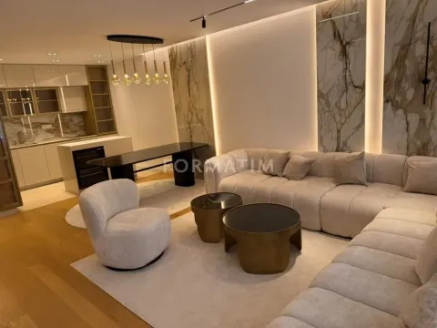 Modern living room with a sofa set and dining area in the background. - image 19