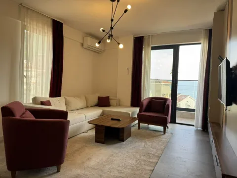 Living room with sofa, armchairs and access to a terrace with sea view. - image 18