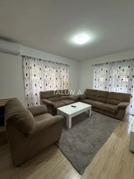 Living room with a seating set and a white coffee table. - image 19
