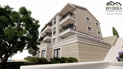 Exterior view of a multi-family residential building with balconies and landscaped yard. - image 3