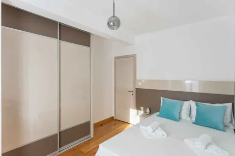 Furnished bedroom with a double bed and a fitted wardrobe. - image 6