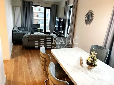 Spacious living room with a dining area and modern furniture. - image 4