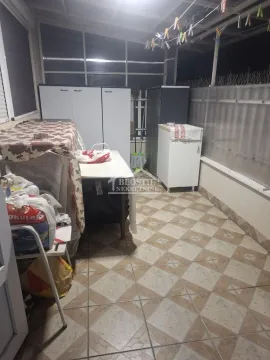 Glazed terrace with tiled floors and storage cabinets. - image 13