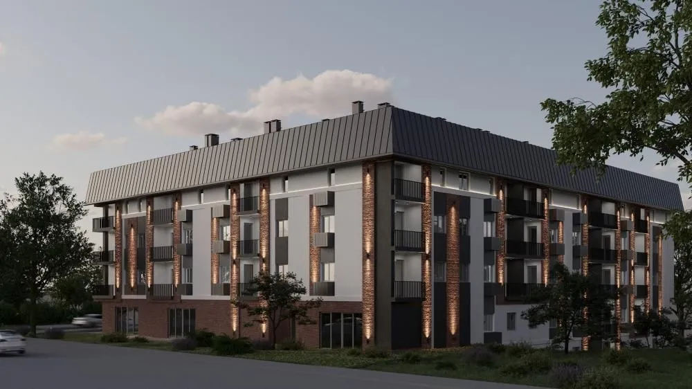Spoljašnji izgled moderne stambene zgrade sa osvetljenjem i balkonima.