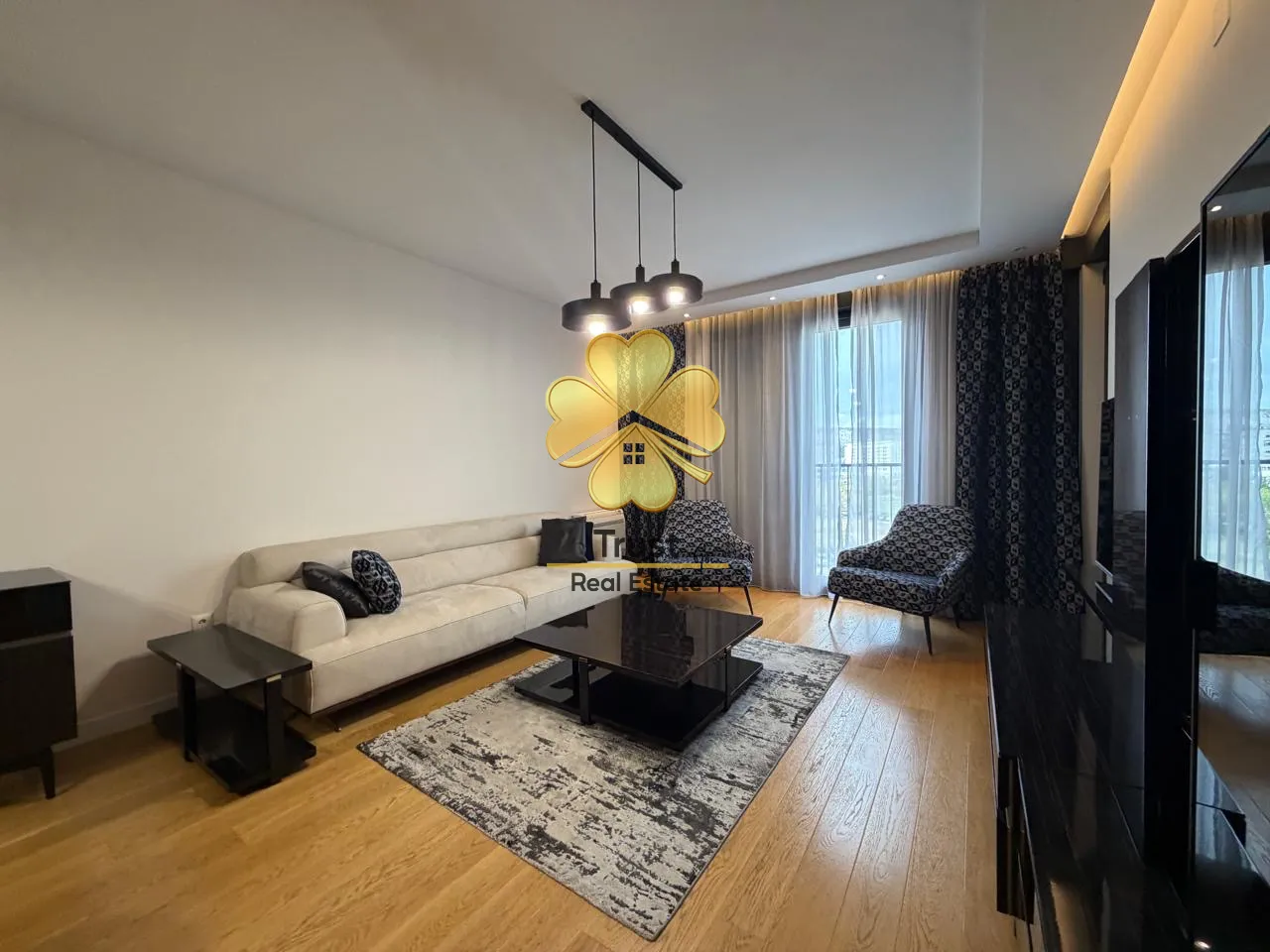 Modern and bright living room with a sofa and coffee table.
