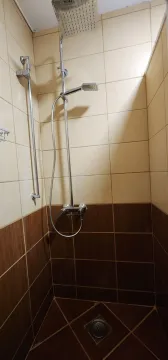 Modern shower cabin with ceramic tiles and chrome fixtures. - image 6
