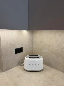 White toaster on the kitchen countertop. - image 5