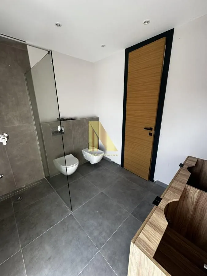 Modern bathroom with a walk-in shower.