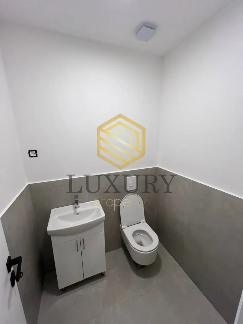 Small bathroom with a sink and toilet bowl.