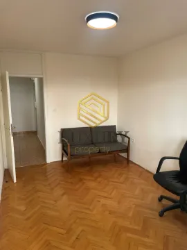 Smaller room with parquet flooring and a two-seater sofa. - image 4