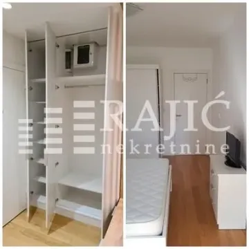 Bedroom with a built-in wardrobe and a bed. - image 9