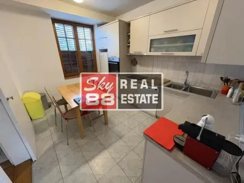 Kitchen with a dining table and a window. - image 5