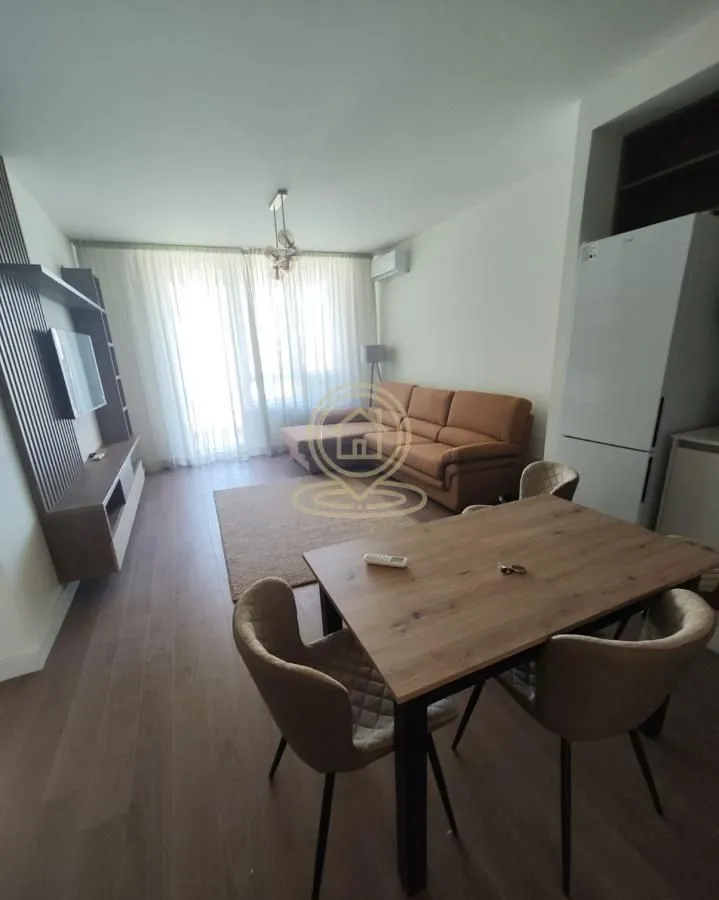 Living room with a dining area and seating set.