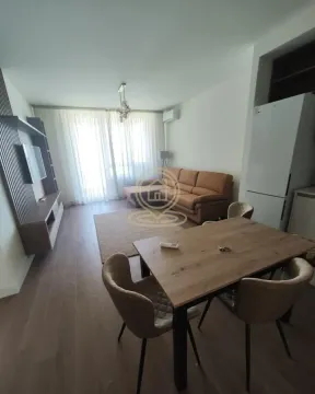 Living room with a dining area and seating set. - image 6