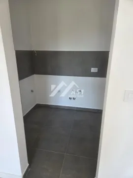 Empty room intended for a kitchen with water and electricity connections. - image 2