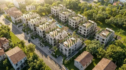 Pogled iz vazduha na kompleks modernih zgrada okruženih zelenilom. - image 9