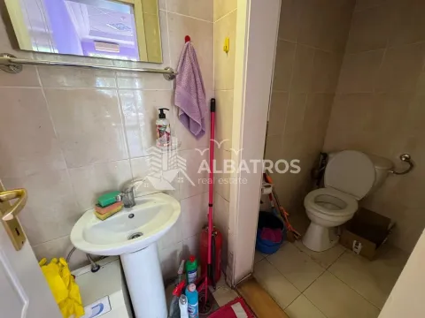 View of the bathroom with a washbasin and toilet. - image 4
