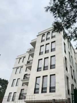 View of the exterior of a modern residential building. - image 2