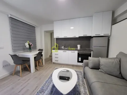 Living room with kitchen and dining area. - image 5