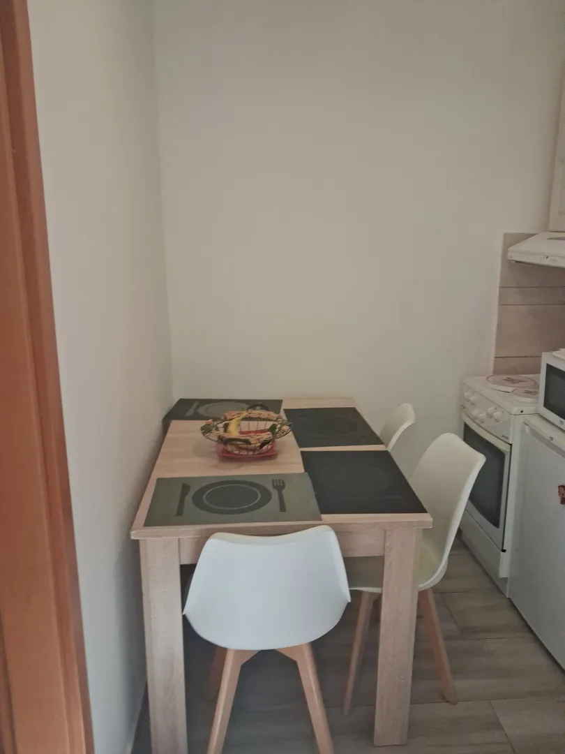 Dining table with chairs in the kitchen.