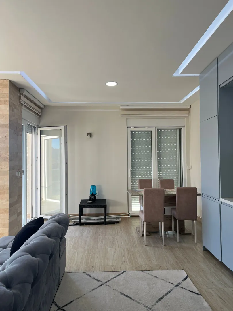 Spacious living room with a dining area and modern furniture.