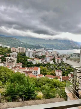 View from the terrace overlooking the city, mountains, and sea. - image 14
