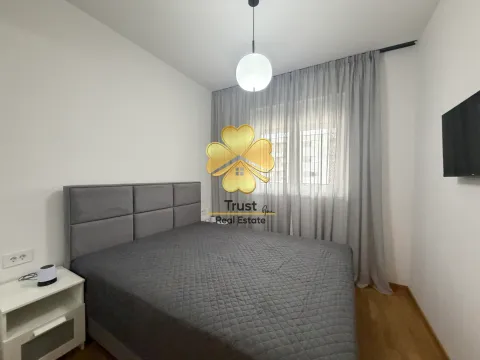 Furnished bedroom with a double bed. - image 12