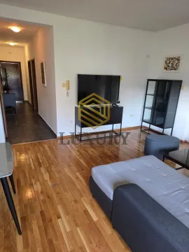 Living room with sofa and TV. - image 8