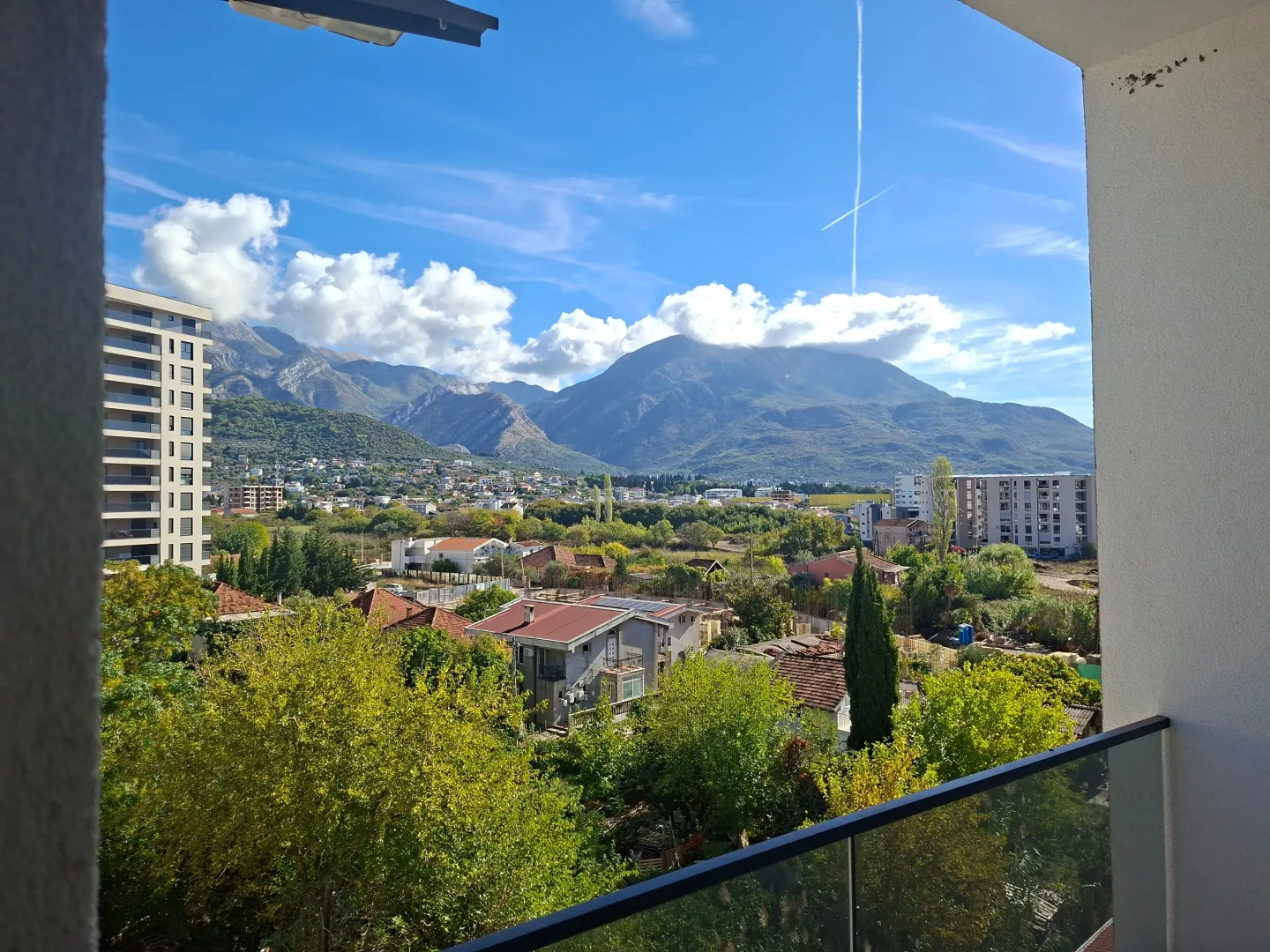 View from the terrace towards the city and mountains.
