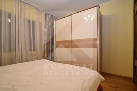 Bedroom with a large wardrobe and a double bed. - image 8