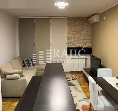 Living room with dining area and sofa set. - image 3