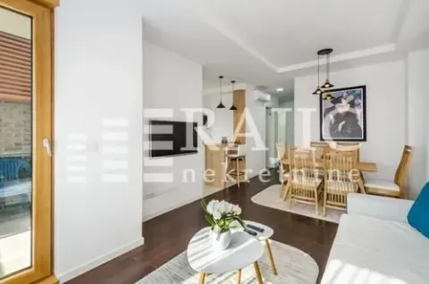 Living room with dining area and access to the terrace. - image 14