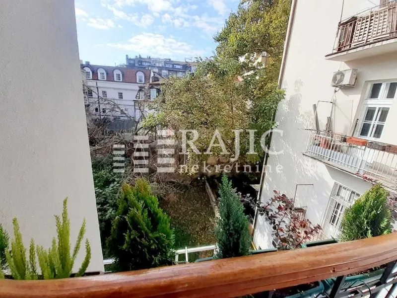 View from the terrace overlooking the courtyard and neighboring buildings.