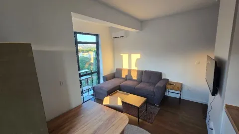 Living room with a sofa set and a dining table. - image 10
